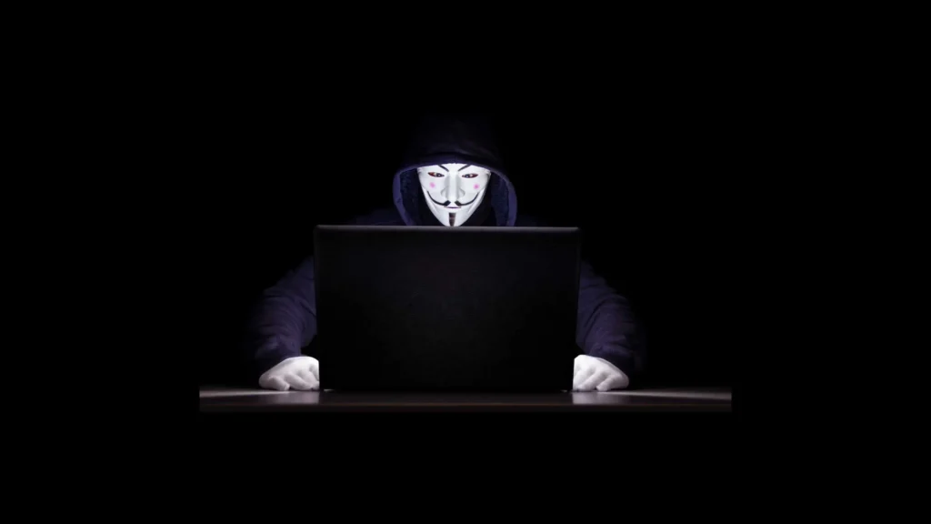 A hacker using a computer