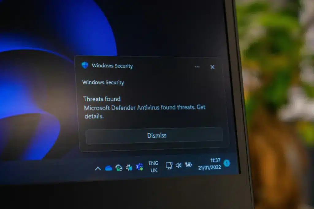 Photo of a Windows laptop with a Windows security pop-up on screen