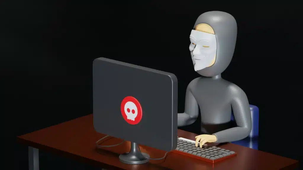 3d animated man in black clothes wearing a white mask sitting at a desk typing on a computer with a red malware symbol on the back