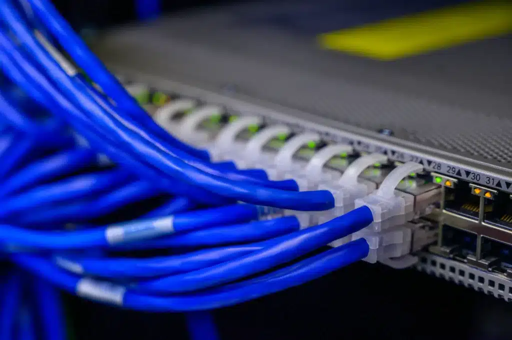 IT Support Bolton blue wires plugged into ports