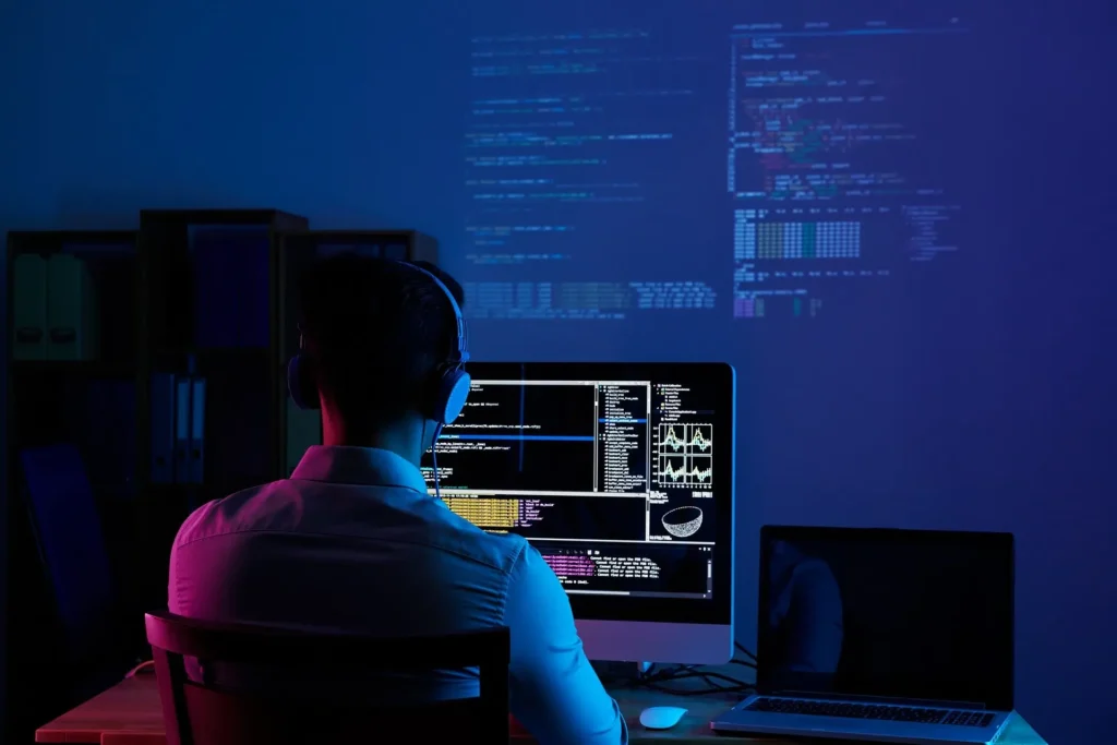 man working on a desktop computer