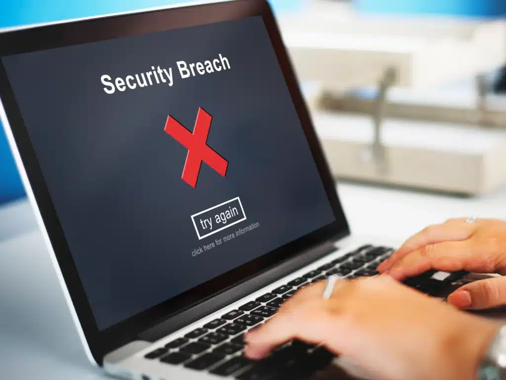 security breach alert showing on a laptop's screen