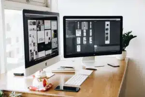 Two monitors on a desk