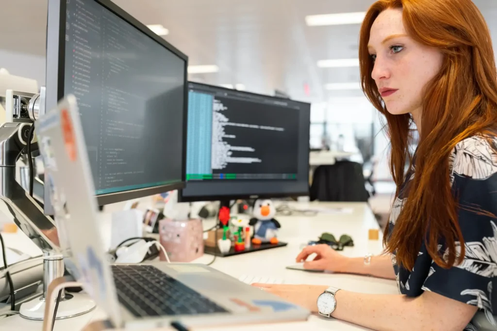 woman typing on a pc keyboard